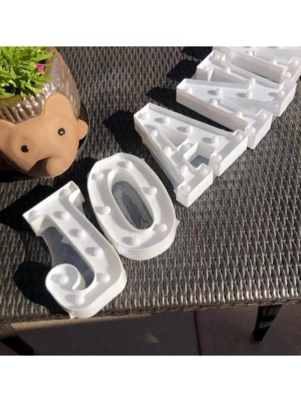 Four Light-Up LED Letters spelling